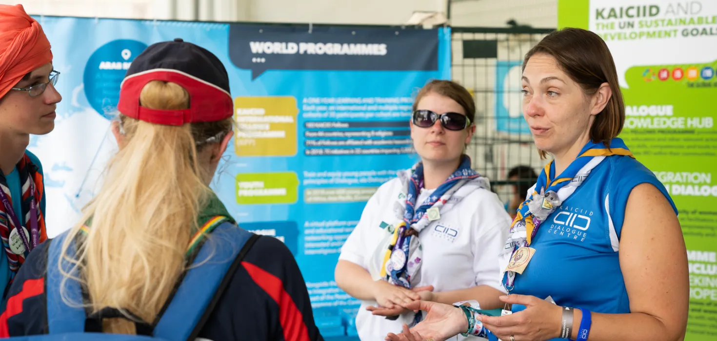 scouts talking to an external partner