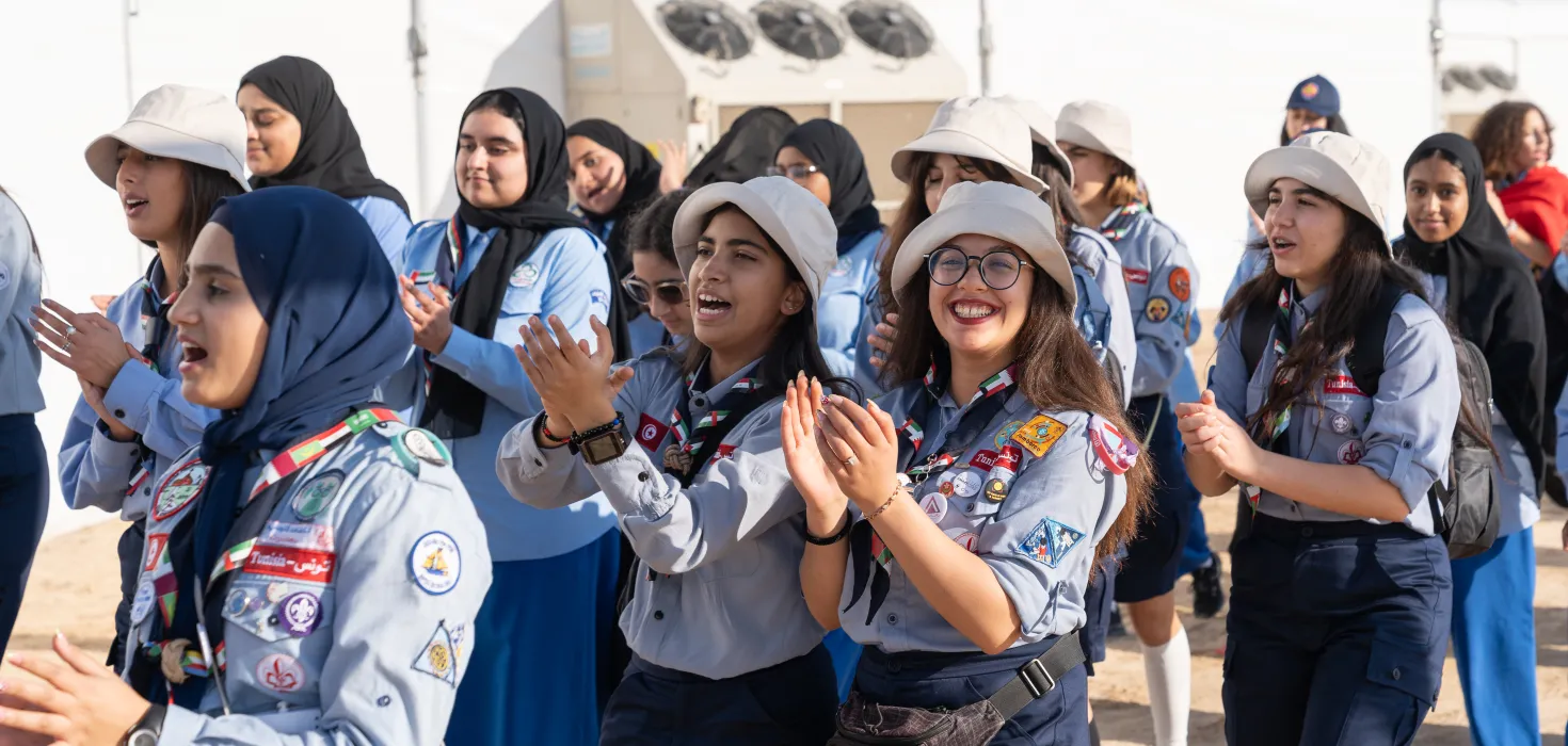 Scouts clapping at an event