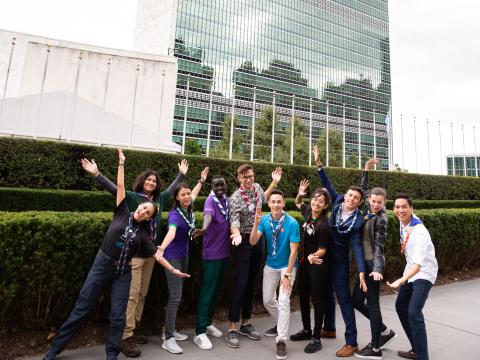 Scouts pose outside the UN headquarters in New York