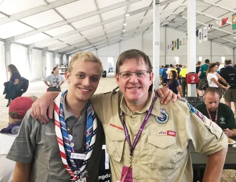 Mark and his son at a World Scouting event