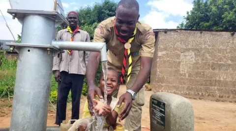 Scout happy trying pure water