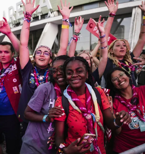 Scouts smile at the closing ceremony of the 16th world scout moot in portugal